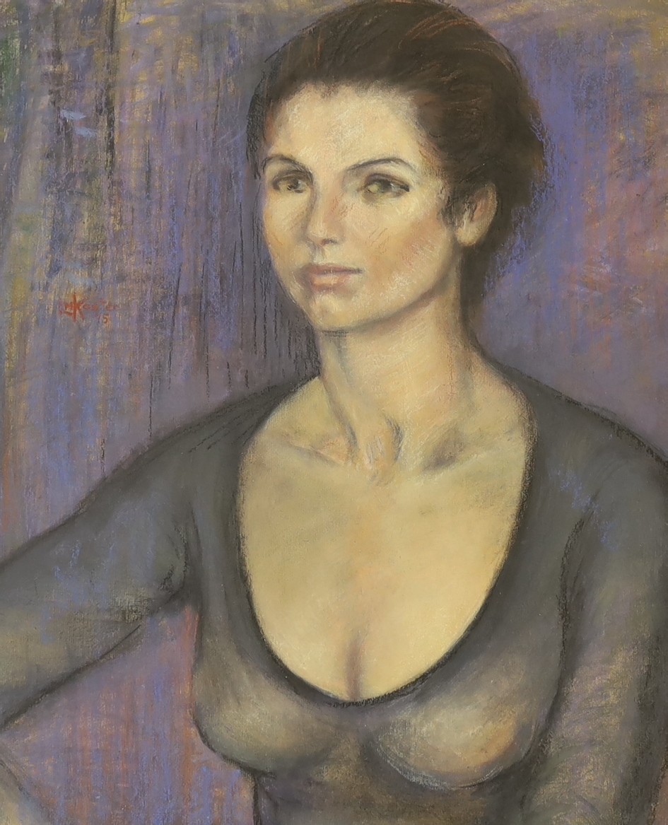 L.M. Koster, pastel, Portrait of a young woman, signed and dated '75, 54 x 44cm